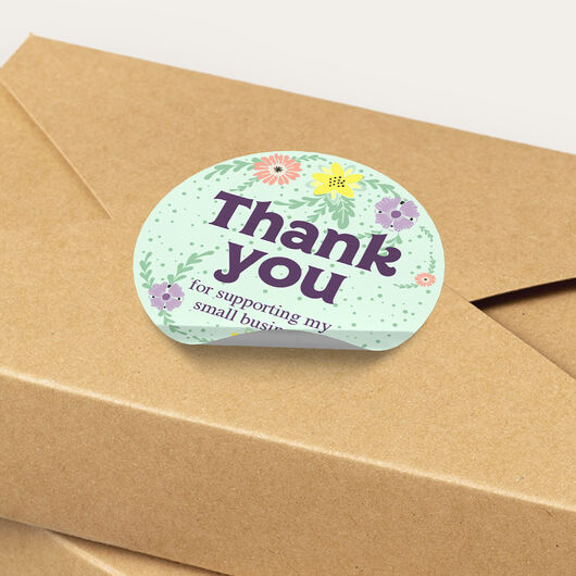 Thank you small business packaging sticker on a shipping box, printed by Plan Photo Repro